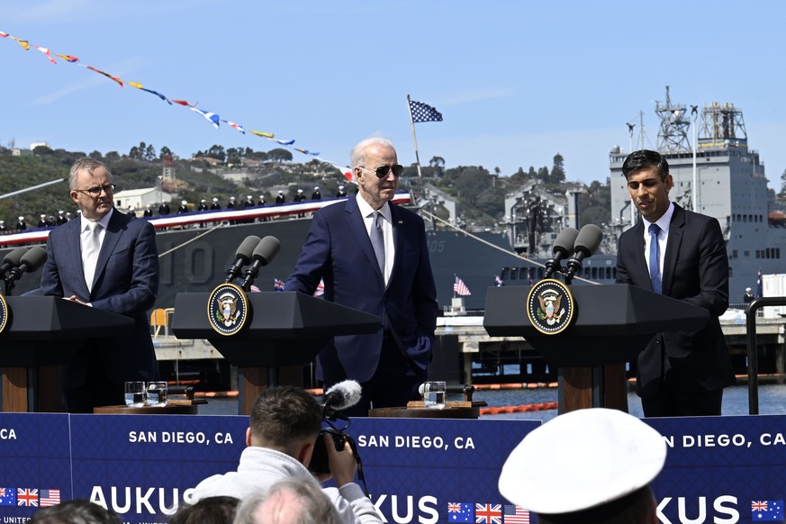 British Prime Minister Rishi Sunak, right, speaks as President Joe Biden, center, and Australian Prime Minister Anthony Albanese listen at Naval Base Point Loma, Monday, March 13, 2023, in San Diego,  ...