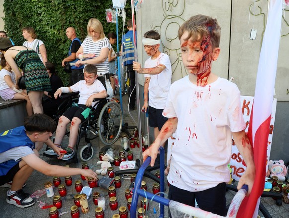 NATO, Save children in Ukraine - protest in Warsaw Photo: Wojciech Olkusnik/East News, NATO, Save children in Ukraine held by Euromaidan in front of the childrens hospital, 9th July in Warsaw, Poland. ...