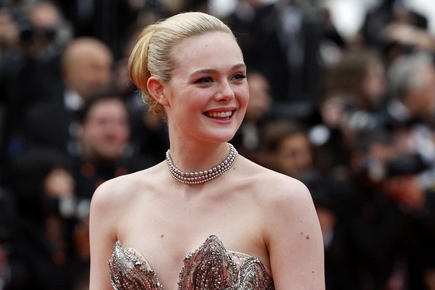 epa10632397 Elle Fanning arrives for the Opening Ceremony of the 76th annual Cannes Film Festival, in Cannes, France, 16 May 2023. The festival runs from 16 to 27 May. EPA/Guillaume Horcajuelo