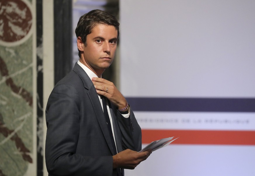 FILE - French Government&#039;s spokesperson Gabriel Attal arrives for a press conference after the weekly cabinet meeting at the Elysee Palace in Paris, Wednesday July 29, 2020. French President Emma ...