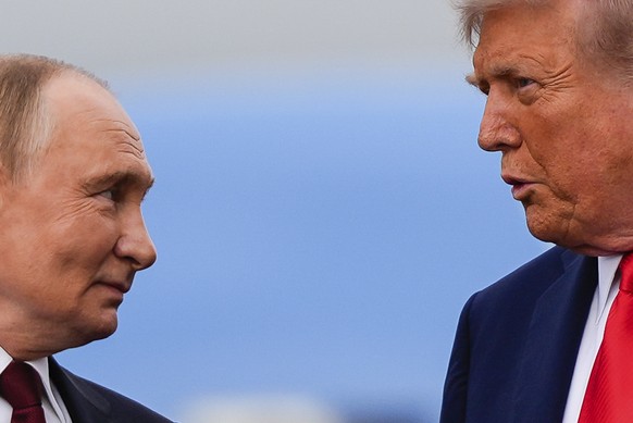 President Donald Trump and Russia&#039;s President Vladimir Putin talk, Friday, Aug. 15, 2025, at Joint Base Elmendorf-Richardson, Alaska. (AP Photo/Julia Demaree Nikhinson)
Pictures of the Week Globa ...