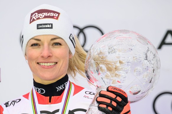 epa11238903 Lara Gut Behrami of Switzerland celebrates on the podium for the Women&#039;s Overall World Cup at the FIS Alpine Skiing World Cup finals in Saalbach Hinterglemm, Austria, 23 March 2024. E ...