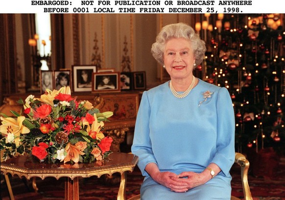 WINDSOR, ENGLAND - DECEMBER 08: Queen Elizabeth II thanks volunteers and key workers at Windsor Castle on December 08, 2020 in Windsor, England. The Queen and members of the royal family gave thanks t ...