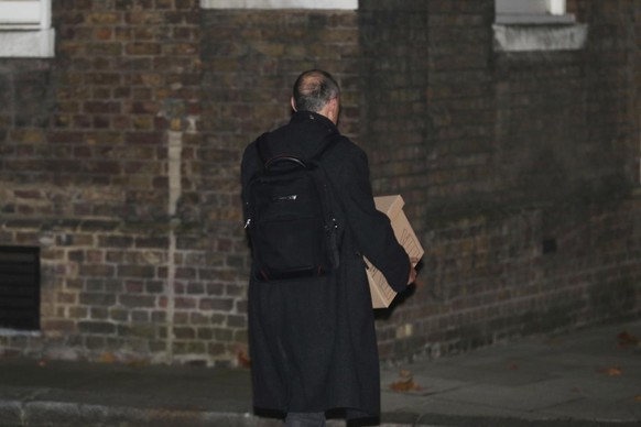 Britain&#039;s Prime Minister Boris Johnson&#039;s top aide Dominic Cummings leaves 10 Downing Street with a box, in London, Friday, Nov. 13, 2020. British Prime Minister Boris Johnson��&amp;#x2122;s  ...
