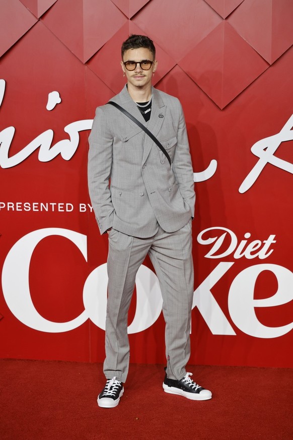 epa10350568 Romeo Beckham arrives for the Fashion Awards 2022 at the Royal Albert Hall in London, Britain, 05 December 2022. The gala event raises money to nurture future generations of fashion talent ...