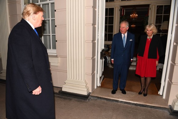 LONDON, ENGLAND - DECEMBER 03: Prince Charles, Prince of Wales and Camilla, Duchess of Cornwall greet US President Donald Trump and wife Melania as they arrive at Clarence House on December 3, 2019 in ...