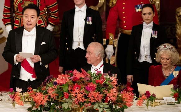 South Korean President state visit to the UK President of South Korea Yoon Suk Yeol listens as King Charles III speaks at the state banquet at Buckingham Palace, London, for the state visit to the UK ...