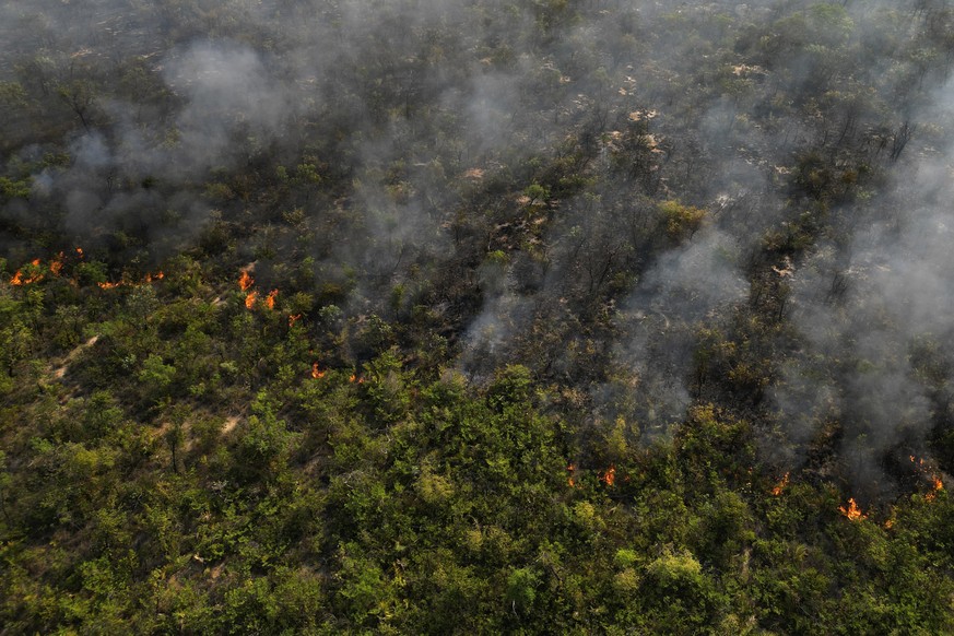 An extensive area of the Serra das Bandeiras forest burns in Barreiras, western Bahia state, Brazil, Thursday, Sept. 21, 2023. According to the National Center for Prevention and Combat of Forest Fire ...