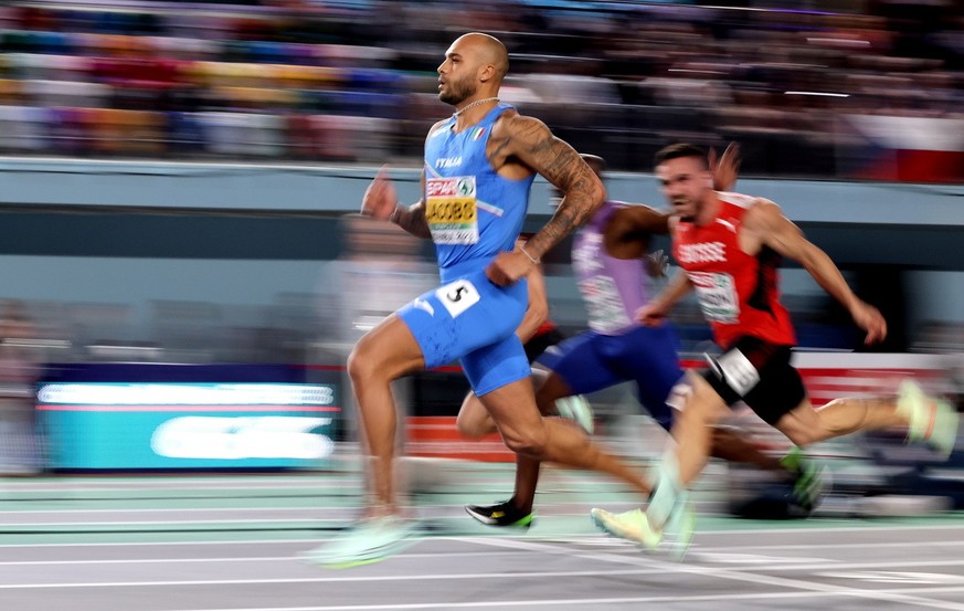 epa10502947 Lamont Marcell Jacobs of Italy competes in the third race in the Men&#039;s 60m semi final at the European Athletics Indoor Championships in Istanbul, Turkey, 04 March 2023. EPA/Tolga Bozo ...