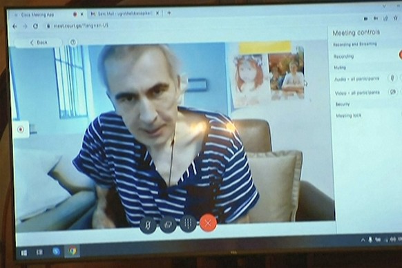 In this image made from video, Georgia&#039;s imprisoned former president Mikheil Saakashvili attends a court hearing from hospital via video link in Tbilisi, Monday, July 3, 2023. Saakashvili appeare ...