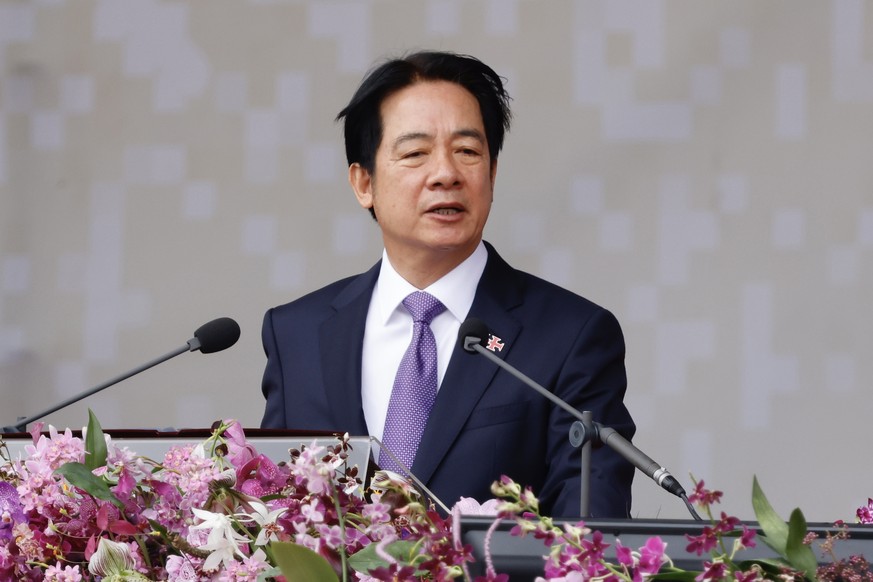 epa11651693 Taiwan President William Lai speaks during the Taiwan National Day celebration in front of the Presidential Office in Taipei, Taiwan, 10 October 2024. In his first National Day speech sinc ...