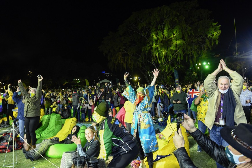BRISBANE, AUSTRALIA - JULY 21: Spectators celebrate after Brisbane was announced the host of the 2032 Olympics during the announcement of the host city for the 2032 Olympic Games, watched via live fee ...
