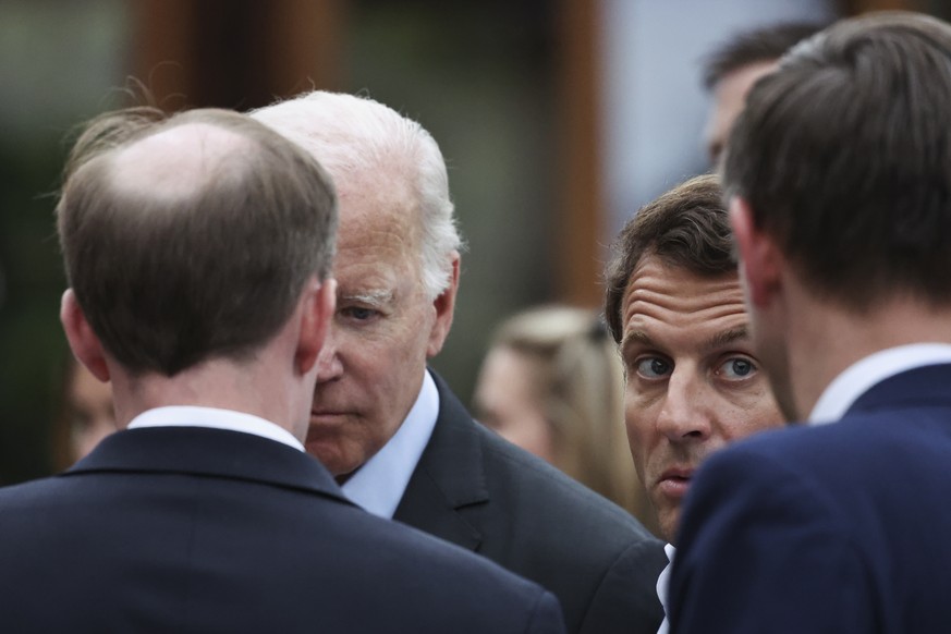 President Joe Biden and President Emmanuel Macron attend the G7 leaders' summit at Castle Elmau in Elmau, near Garmisch-Partenkirchen, Germany, Monday, June 27, 2022. The Group of Seven leading e ...