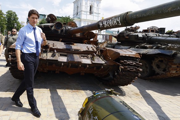 epa10683149 Canadian Prime Minister Justin Trudeau visits an exhibition of destroyed vehicles on the day of his visit at the Wall of Remembrance to pay tribute to killed Ukrainian soldiers, in Kyiv (K ...