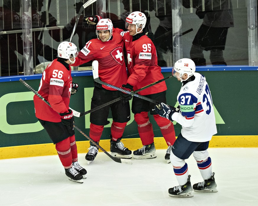 Switzerland&#039;s Tyler Moy celebrates after scoring during the group B match between Norway and Switzerland at the IIHF Ice Hockey World Championships in Herning, Denmark, Friday May 16, 2025. (Henn ...
