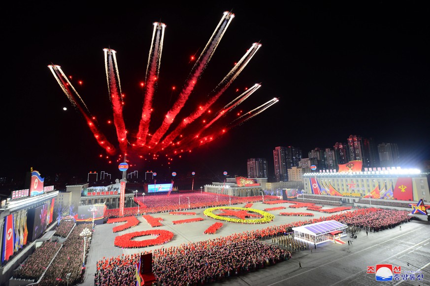 epaselect epa10455977 A photo released by the official North Korean Central News Agency (KCNA) shows a fireworks display during a military parade at Kim Il Sung Square to mark the 75th anniversary of  ...