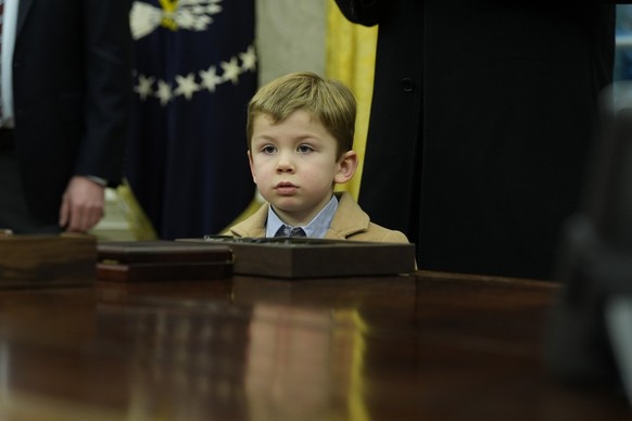 X � A-Xii, son of Elon Musk, listens in the Oval Office at the White House, Tuesday, Feb. 11, 2025, in Washington. (Photo/Alex Brandon)