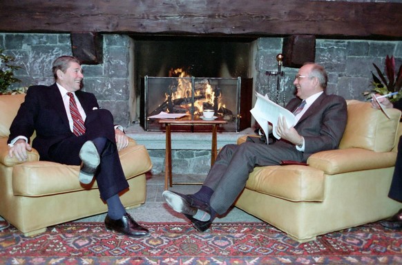 A handout image released by Ronald Reagan Presidential Library dated 19 November 1985 shows US President Ronald Reagan and Soviet General Secretary Mikhail Gorbachev (R) at the first Summit in Geneva, ...