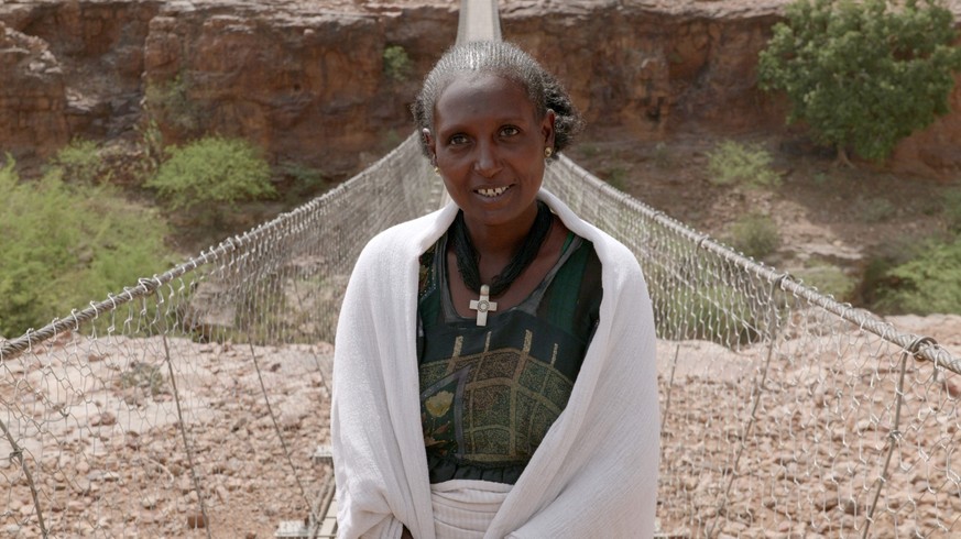 Genet Kessie on the newly built Bridge by helvetas in Ziquala Ethiopia.