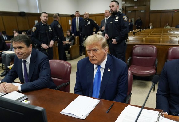 Former President Donald Trump awaits the start of proceedings during jury selection at Manhattan criminal court, Thursday, April 18, 2024 in New York. (Timothy A. Clary/Pool Photo via AP)