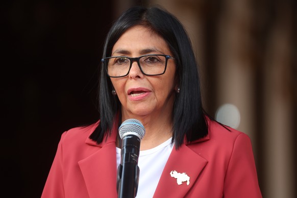 epa12795638 Delcy Rodriguez, the acting president of Venezuela, speaks alongside US Secretary of the Interior Doug Burgum in Caracas, Venezuela, 04 March 2026. The two officials met to discuss coopera ...