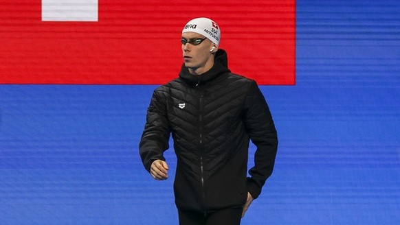 Roman Mityukov (SUI) walks in before competing in the Men&#039;s 200m Backstroke Semifinal during the swimming events at the 2024 Paris Summer Olympics at La Defense Arena, in Paris, France, Wednesday ...