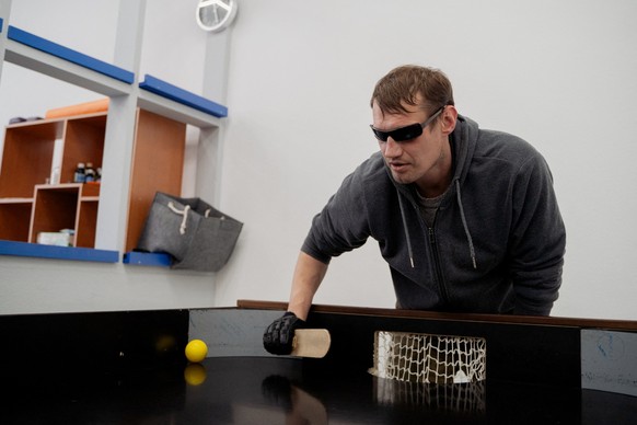 Former soldier Dmytro Gorodynsky plays an educational game at Trinity Hub, a rehabilitation centre for the visually impaired in Kyiv, on February 7, 2025, amid the Russian invasion of Ukraine. The 39- ...