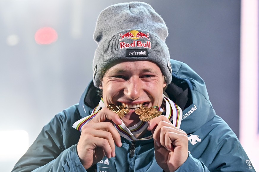 Winner Marco Odermatt of Switzerland celebrates during the medal ceremony of the men&#039;s giant slalom race at the 2023 FIS Alpine Skiing World Championships in Courchevel/Meribel, France, Friday, F ...