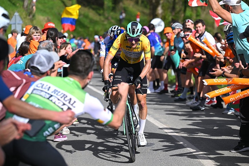 EIBAR, SPAIN - APRIL 10: Paul Seixas of France and Team Decathlon CMA CGM - Yellow Leader Jersey leads the breakaway while fans cheer during the 65th Itzulia Basque Country 2026, Stage 5 a 176.2km sta ...