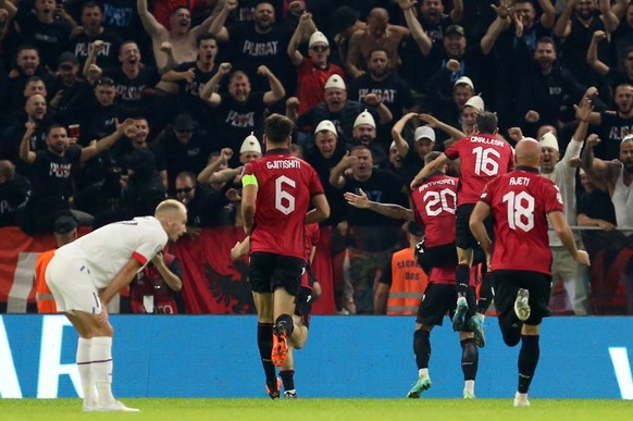 epa10915788 Albania&#039;s Taulant Seferi celebrates with teammates after scoring the 2-0 during the UEFA EURO 2024 group E qualification round match between Albania and Czech Republic in Tirana, Alba ...