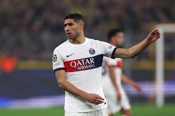 epa11027861 PSG?s Achraf Hakimi reacts during the UEFA Champions League group stage soccer match between Borussia Dortmund and Paris Saint-Germain, in Dortmund, Germany, 13 December 2023. EPA/CHRISTOP ...