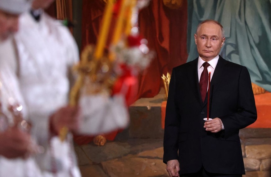MOSCOW, RUSSIA - MAY 05: (RUSSIA OUT) Russian President Vladimir Putin attends the Easter service at the Christ The Saviour Cathedral, May 5, 2024, in Moscow, Russia. This year Russian Orthodox Church ...