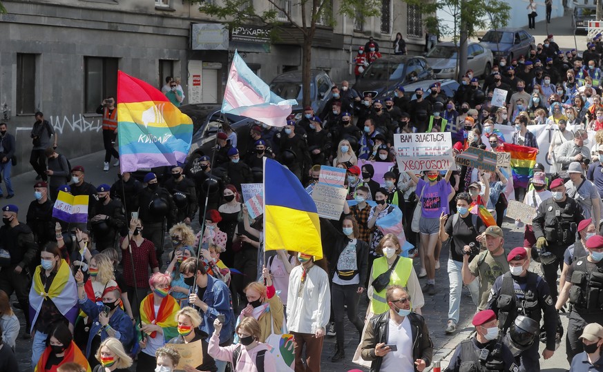 epa09219737 Transgenders and their supporters attend the Trans-march in downtown Kiev, Ukraine, 22 May 2021. Transgenders gathered to get the attention of the Ukrainian authorities to their problems.  ...