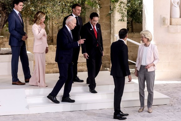 FASANO, ITALY - JUNE 13: Italy's Prime Minister Giorgi Meloni greets President of France Emmanuel Macron during the first day of the G7 meeting at Borgo Egnazia resort, on June 13, 2024 in Fasano ...