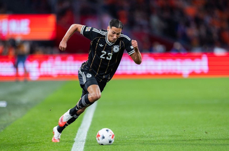 AMSTERDAM, NETHERLANDS - SEPTEMBER 24: Younes Ebnoutalib of Germany runs with the ball during the UEFA Nations League 2026/27 group phase match between Netherlands and Germany at Johan Cruijff Arena o ...