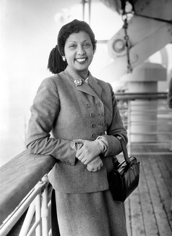 FILE - Entertainer Josephine Baker is seen aboard the French liner Liberte upon her arrival in New York City harbor, on October 3, 1950. France is inducting Josephine Baker ��&amp;#x201c; Missouri-bor ...