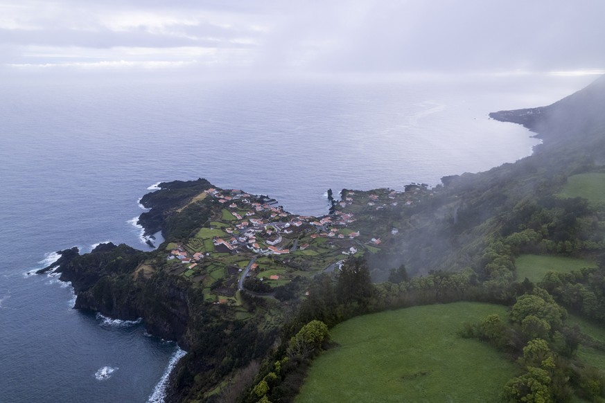 epa09851609 A view on Faja dos Cubres at Concelho de Velas, Sao Jorge island, Azores, Portugal, 26 March 2022. The island of Sao Jorge has counted about 12,700 earthquakes since 19th March, more than  ...