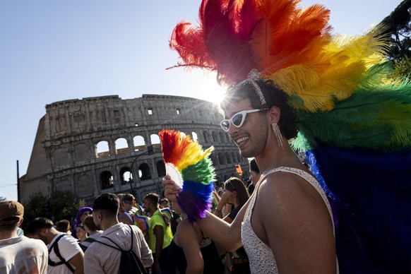 epaselect epa13052345 Participants donning rainbow colours attend the Rome Pride 2026 march in Rome, Italy, 20 June 2026. This year's theme centers on the concept of the 'Republic', int ...