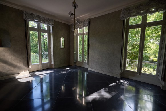 (FILES) This photograph shows a sitting room of a former residence of the late German fashion designer Karl Lagerfeld, in Louveciennes, near Paris, on May 15, 2025. The historic 19th century house, al ...