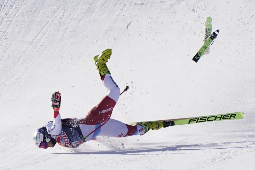 Switzerland&#039;s Urs Kryenbuehl crashes at finish line during an alpine ski, men&#039;s World Cup downhill in Kitzbühel, Austria, Friday, Jan. 22, 2021. (AP Photo/Giovanni Auletta)