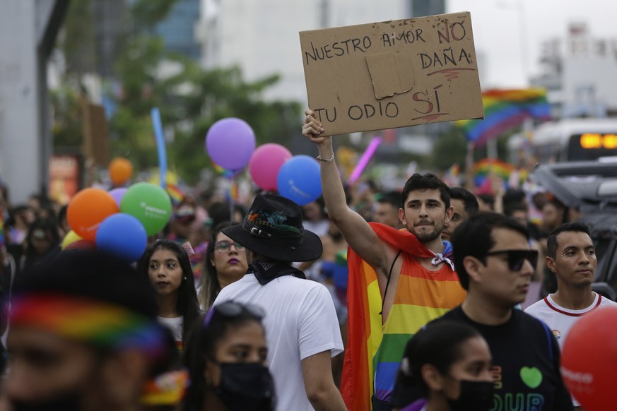 epa10034352 Hundreds of people participate in the LGBTI+ Pride march, in Panama City, Panama, 25 June 2022. EPA/Bienvenido Velasco