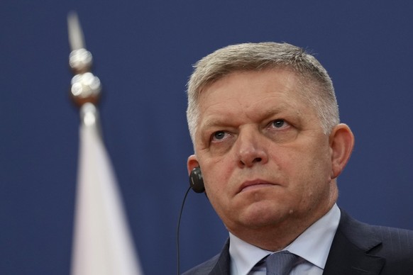 Slovakia&#039;s Prime Minister Robert Fico listens Serbian President Aleksandar Vucic during a news conference in the Serbia Palace in Belgrade, Serbia, Thursday, Nov. 21, 2024. (AP Photo/Darko Vojino ...
