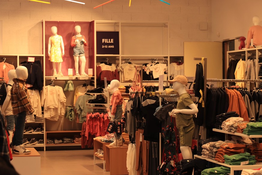 Moulins, France - september 15th 2022: Kiabi Fashion store Girls department. Kiabi is French enterprice of clothing stores, Sugn reads Girls, 3-12 years in French.
