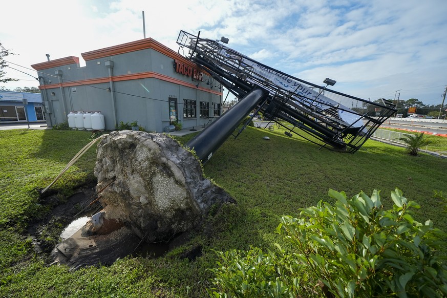 A billboard structure is seen after it was uprooted during Hurricane Milton, Thursday, Oct. 10, 2024, in Clearwater, Fla. (AP Photo/Julio Cortez)