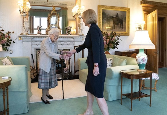 epa10164089 Queen Elizabeth II welcomes Liz Truss during an audience at Balmoral, Scotland, Britain 06 September 2022. Truss was in Balmoral for an audience with Queen Elizabeth II where she was invit ...
