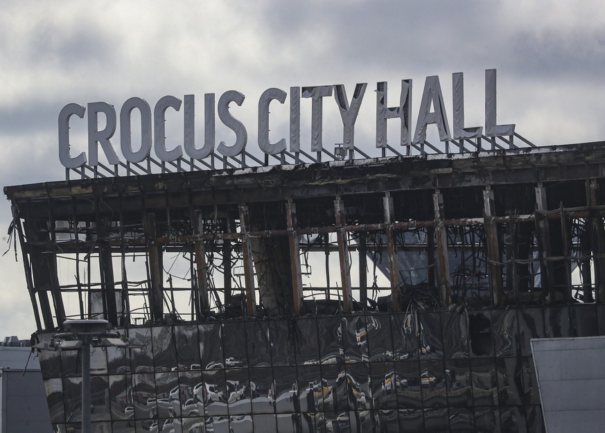 epa11242472 A view of the burned Crocus City Hall concert venue following a terrorist attack in Krasnogorsk, outside Moscow, Russia, 25 March 2024. At least 137 people were killed and more than 100 ho ...
