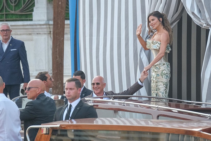 VENICE, ITALY - JUNE 26: Jeff Bezos and Lauren Sanchez leave the Aman Hotel to go to dinner with guests ahead of their wedding, on June 26, 2025 in Venice, Italy. (Photo by Stefano Mazzola/GC Images)