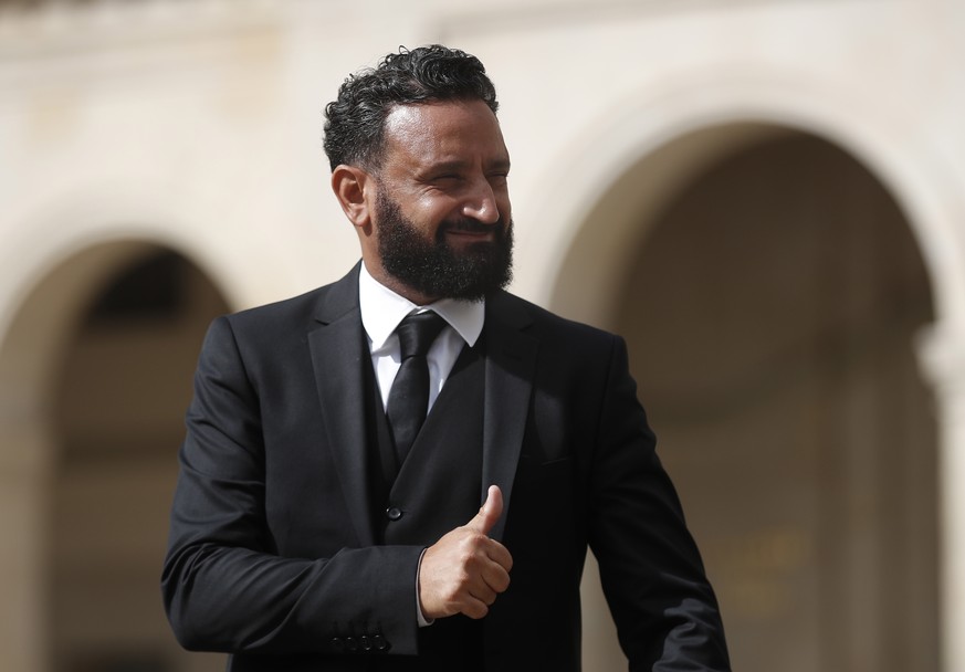 epa09457498 French TV host Cyril Hanouna arrives to the tribute ceremony for late French actor Jean-Paul Belmondo, at the Hotel des Inavlides, France, Paris, 09 September 2021. French actor Jean-Paul  ...