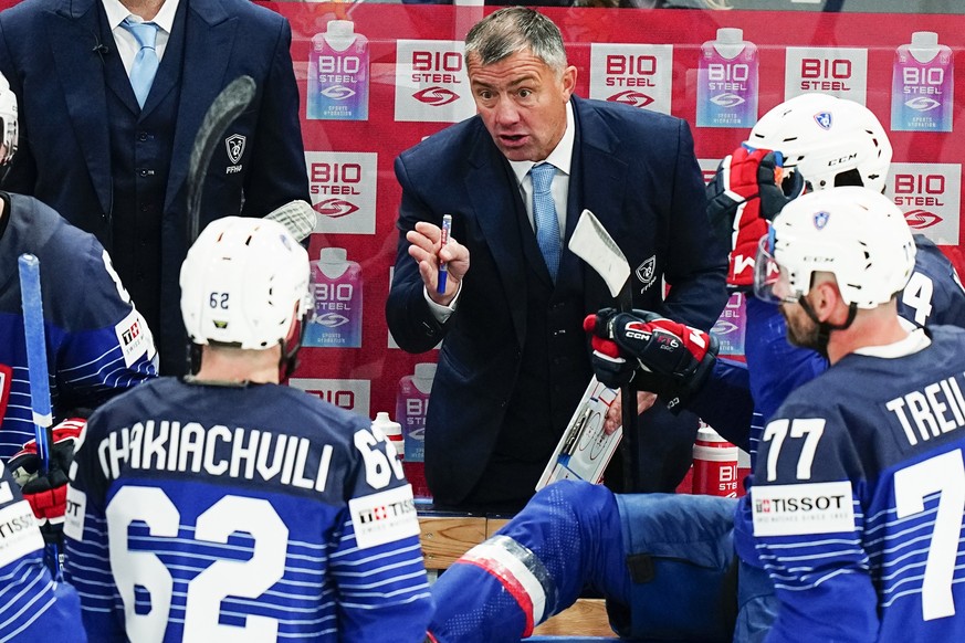 France's head coach Philippe Bozon gestures during the group A match between France and Austria at the IIHF ice hockey world championship in Tampere, Finland, Saturday, May 13, 2023. (AP Photo/Pa ...
