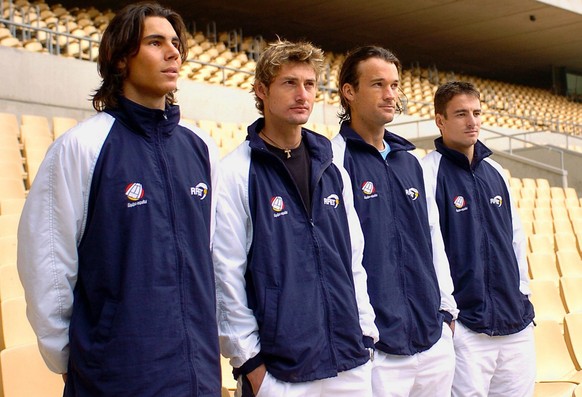 (From L-R) Spain's Davis Cup team players Rafael Nadal, Juan Carlos Ferrero, Carlos Moya and Tommy Robredo pose after the press conference at Olympic Stadium, in Seville, southern Spain, Tuesday  ...